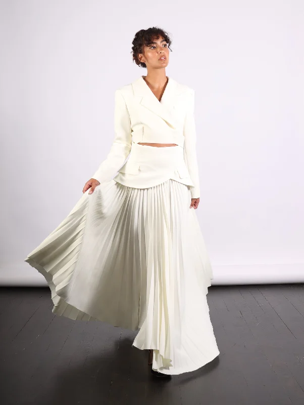 Maxi Pleated Asymmetric Skirt in Ivory by A.W.A.K.E. Mode